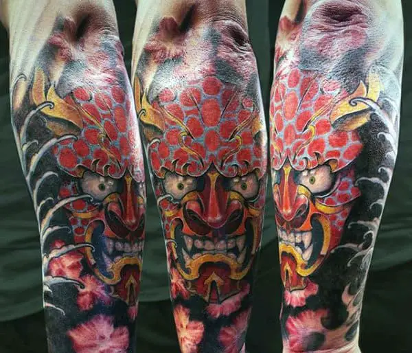 hannya-mask-tatto-with-leering-mouth-guys-forearm-sleeve-tattoo-ideas