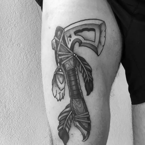 hatchet-guys-tattoo-designs-on-thigh-of-leg