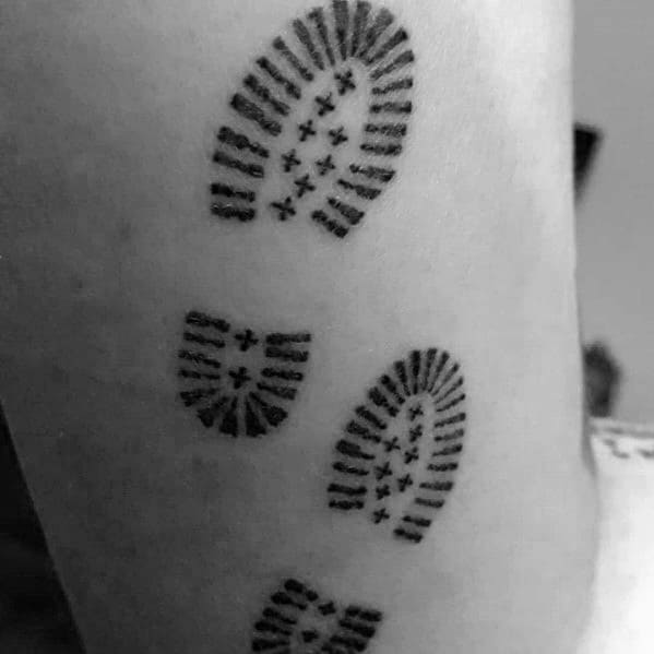 Showcase your adventurous spirit with a mountain range tattoo