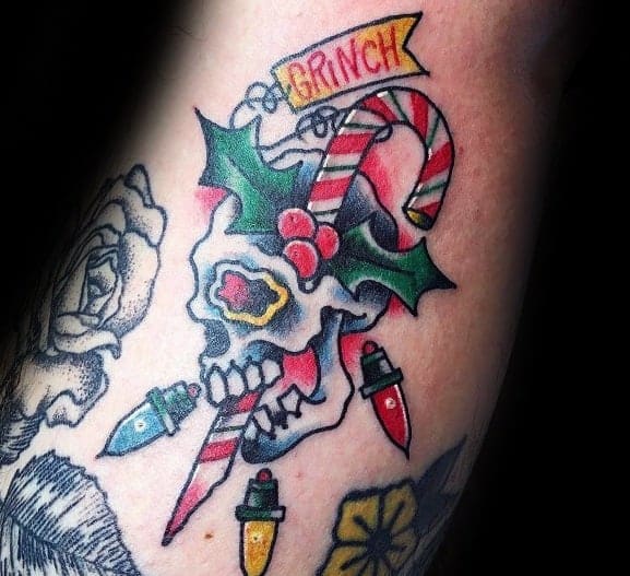 skull-with-christmas-lights-grinch-tattoo-ideas-for-men