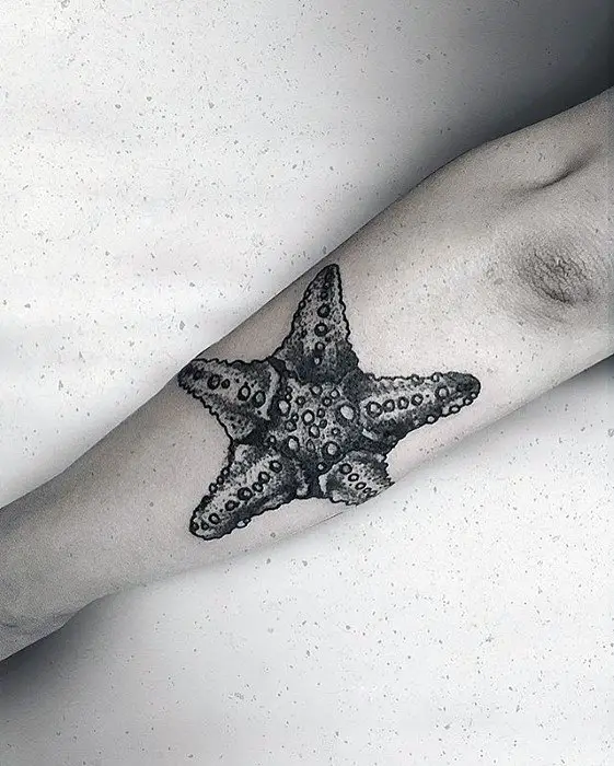 guys-starfish-tattoos-on-outer-forearm