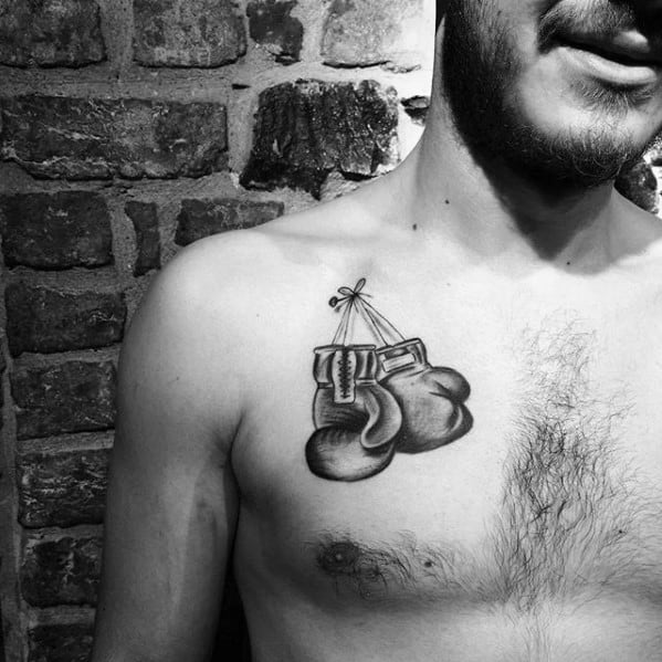 upper-chest-boxing-gloves-mens-sports-tattoo-design-inspiration