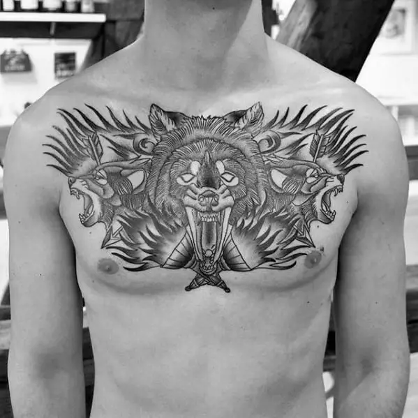 cool-male-torch-chest-tattoo-designs