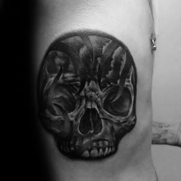 amazing-mens-rib-cage-side-of-body-tribal-skull-tattoo-designs