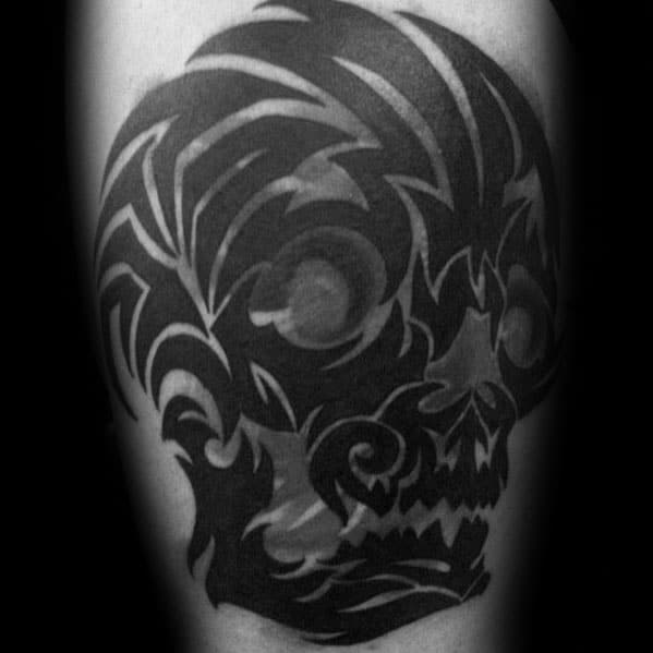 cover-up-tribal-skull-guys-tattoo-designs