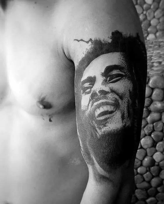 distinctive-male-arm-bob-marley-tattoo-designs