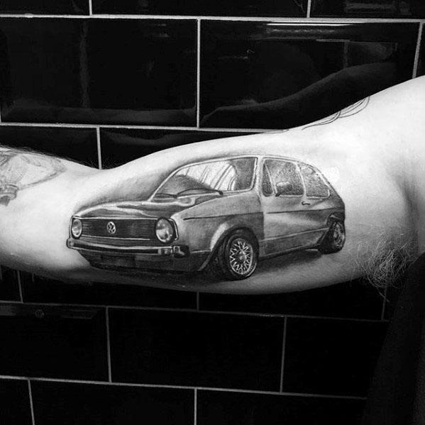 guys-inner-arm-bicep-tattoos-with-volkswagen-wv-design