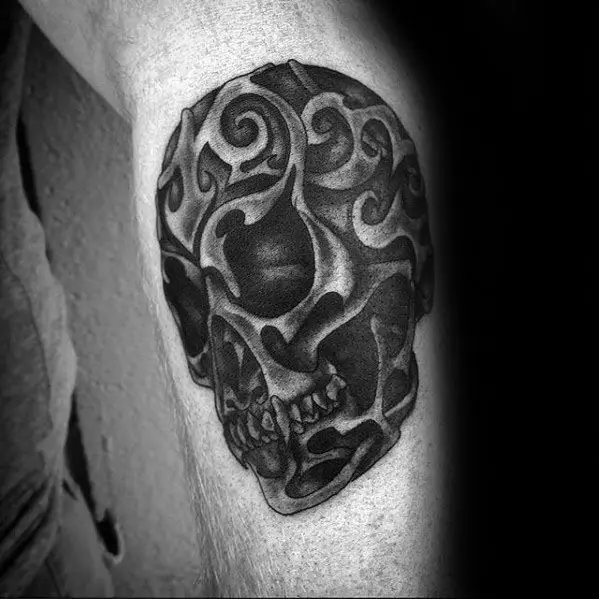 guys-leg-calf-tribal-skull-tattoo-design-ideas