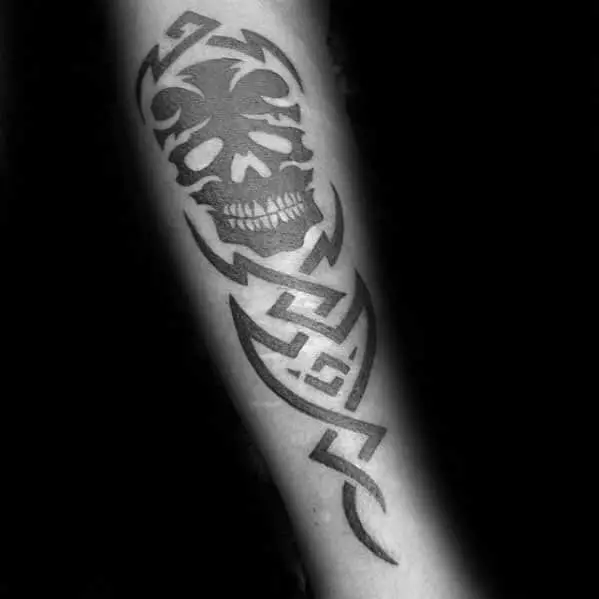 inner-forearm-guys-tribal-skull-tattoos