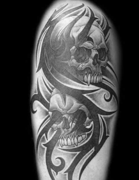 male-arm-tattoo-with-tribal-skull-design