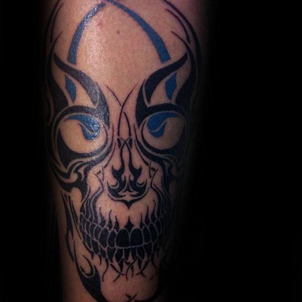 male-blue-and-black-tribal-skull-tattoo-ideas