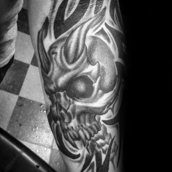male-forearm-sleeve-tribal-skull-tattoo-design-inspiration
