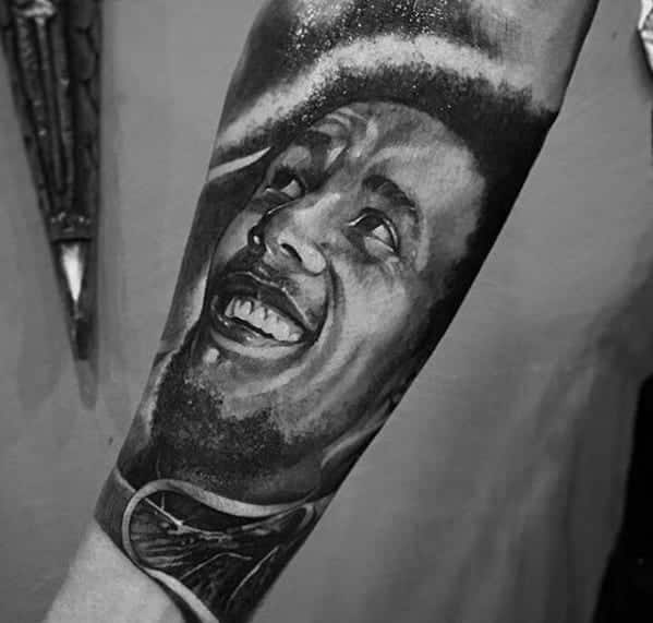 male-forearm-tattoo-with-bob-marley-design