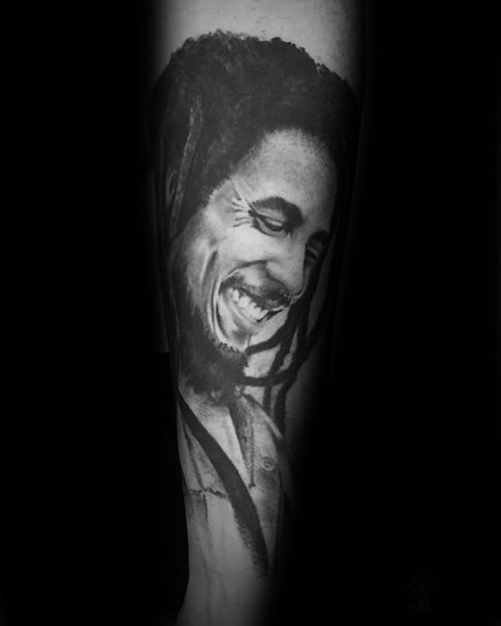 mens-tattoo-with-bob-marley-design