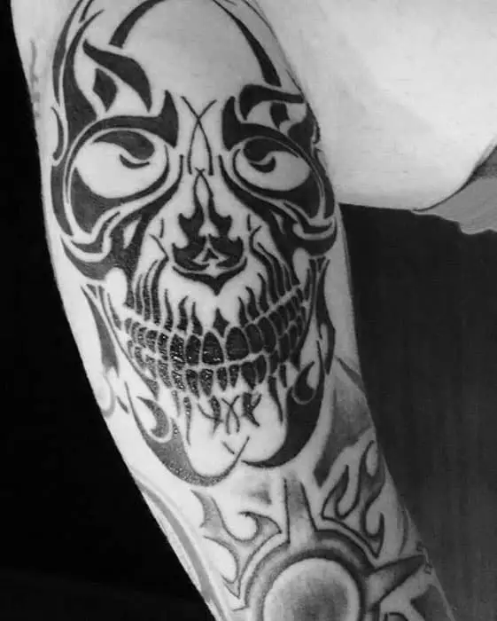 mens-tribal-skull-tattoo-design-inspiration