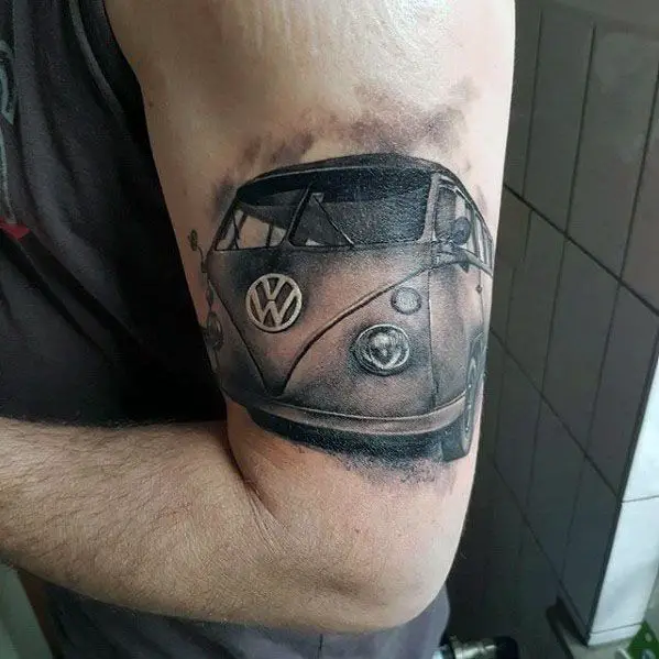 outer-arm-male-tattoo-with-volkswagen-wv-design
