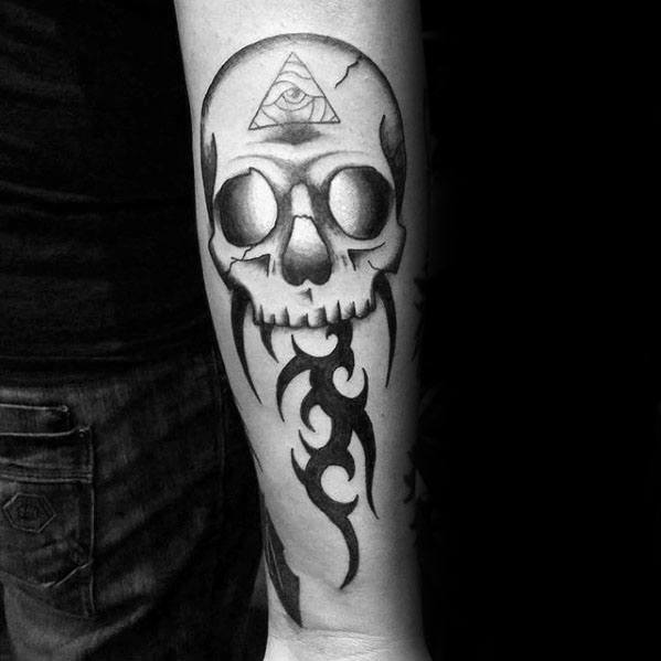 outer-forearm-tribal-skull-guys-tattoo-ideas