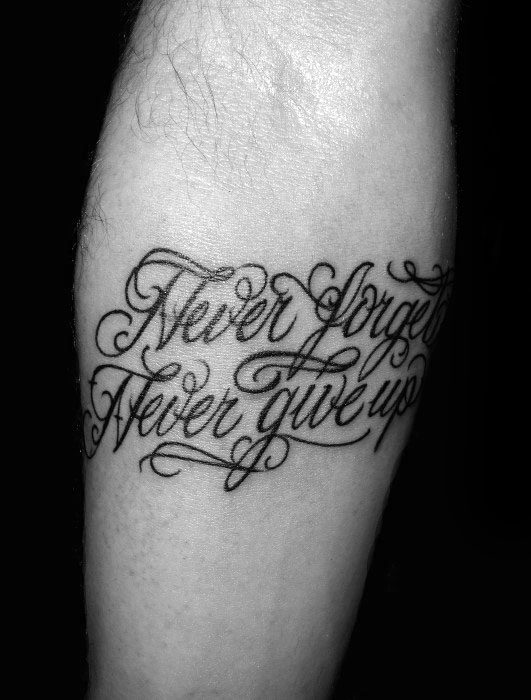 forearm-male-tattoo-with-never-give-up-design