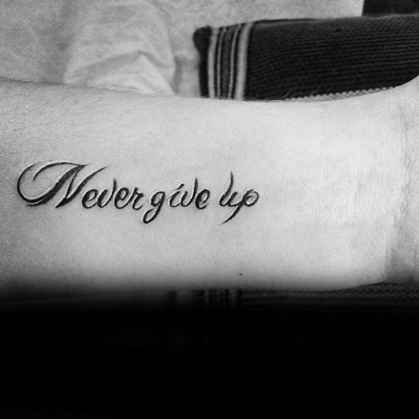 small-simple-cool-never-give-up-tattoo-design-ideas-for-male