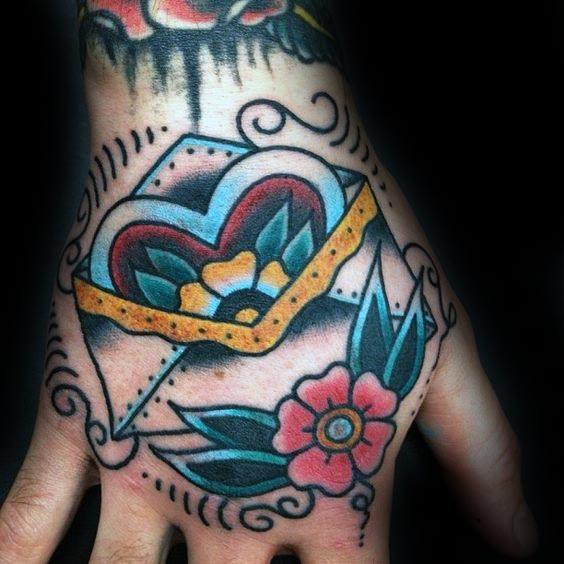 male-envelope-traditional-hand-tattoo-ideas