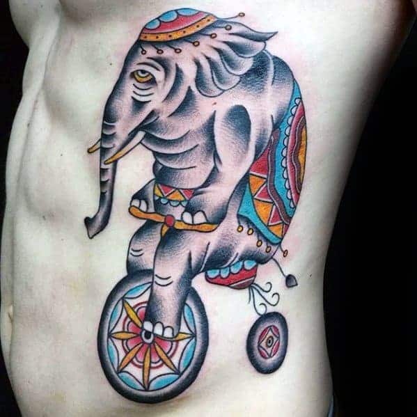 elephant-on-bike-rib-cage-side-circus-tattoos-for-gentlemen