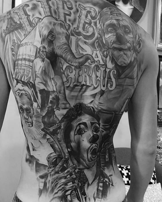 gentleman-with-circus-themed-shaded-full-back-tattoo