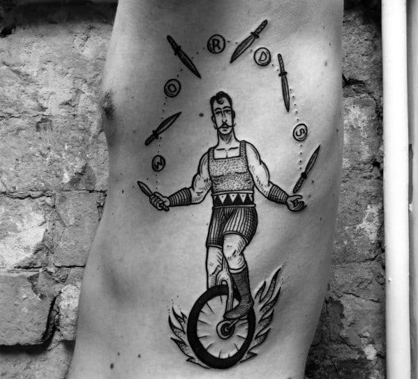 rib-cage-side-mens-tattoo-circus-juggler-riding-unicycle-design