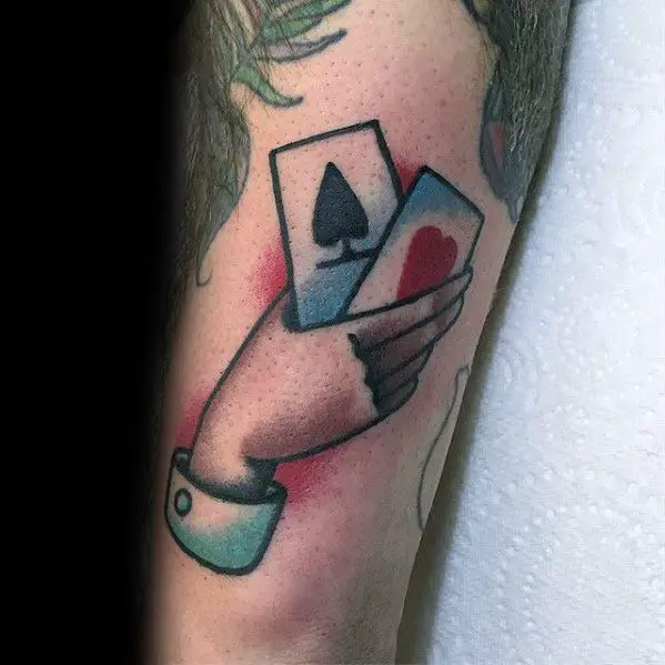 good-luck-guys-playing-cards-with-hand-outer-forearm-tattoo-ideas