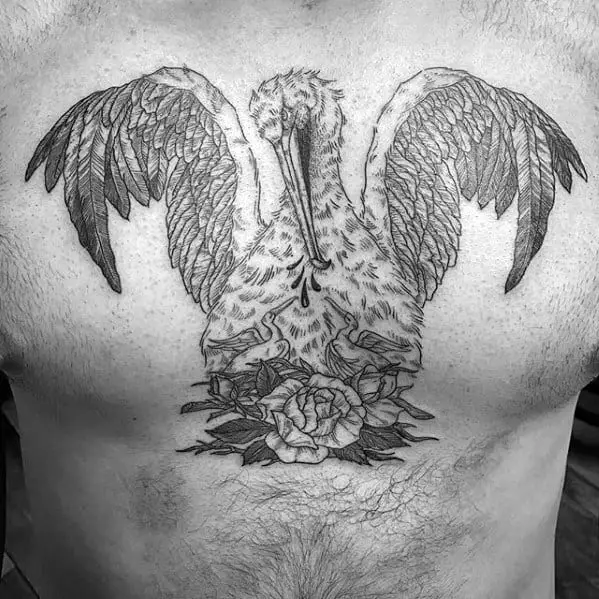 male-tattoo-with-pelican-design-on-upper-chest