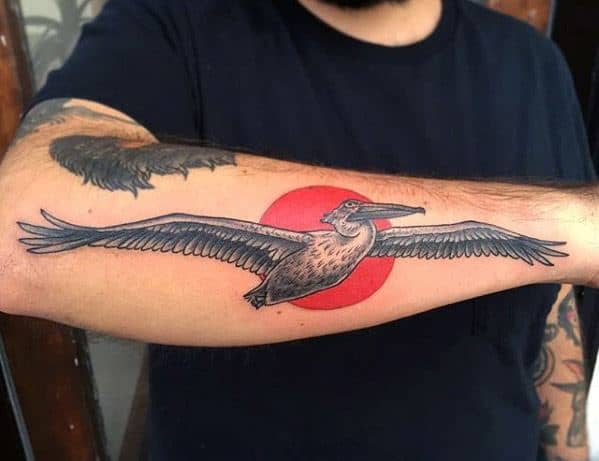 outer-forearm-red-sun-pelican-guys-tattoo-ideas