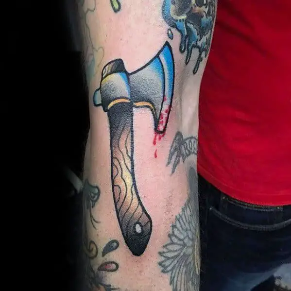 axe-outer-arm-male-tattoo-with-filler-design