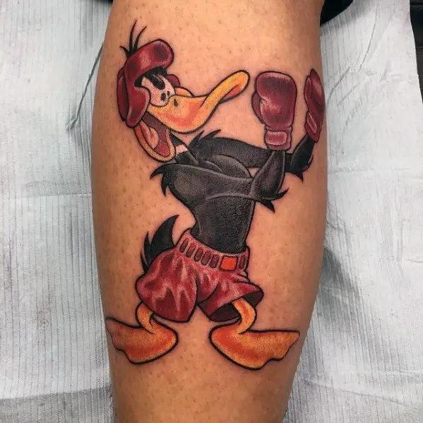 distinctive-male-looney-tunes-daffy-duck-tattoo-boxing-leg-calfdesigns