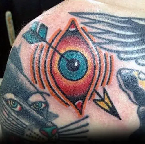 incredible-filler-blue-eyewith-arrow-shoulder-tattoos-for-men