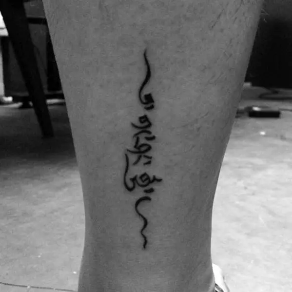 lower-leg-sanskrit-tattoo-design-on-man