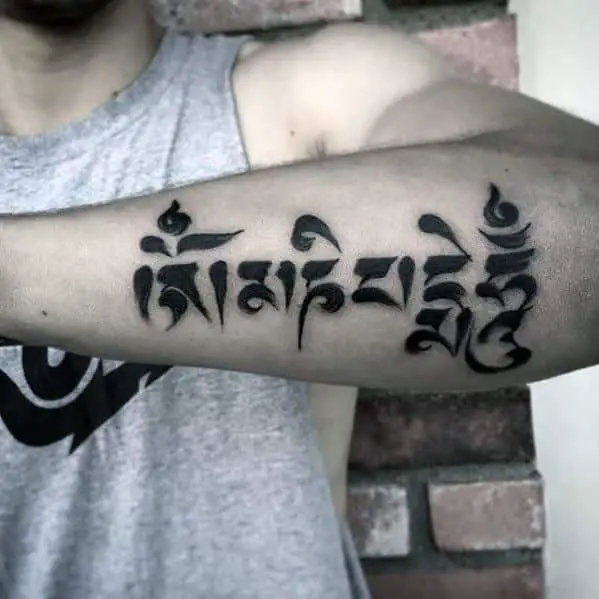 male-sanskrit-tattoo-design-inspiration-on-outer-forearm