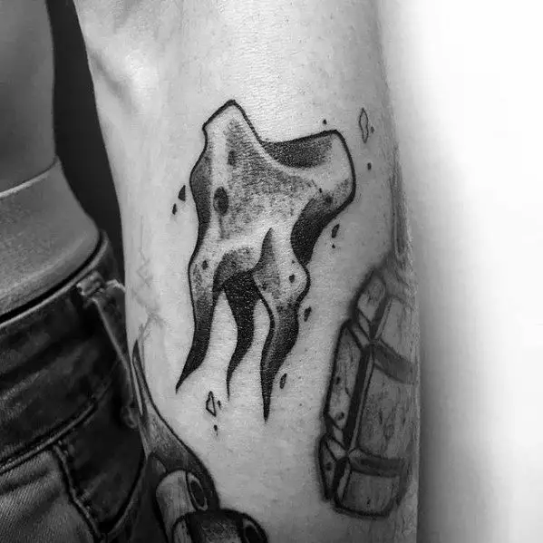 outer-forearm-tooth-filler-tattoo-on-men
