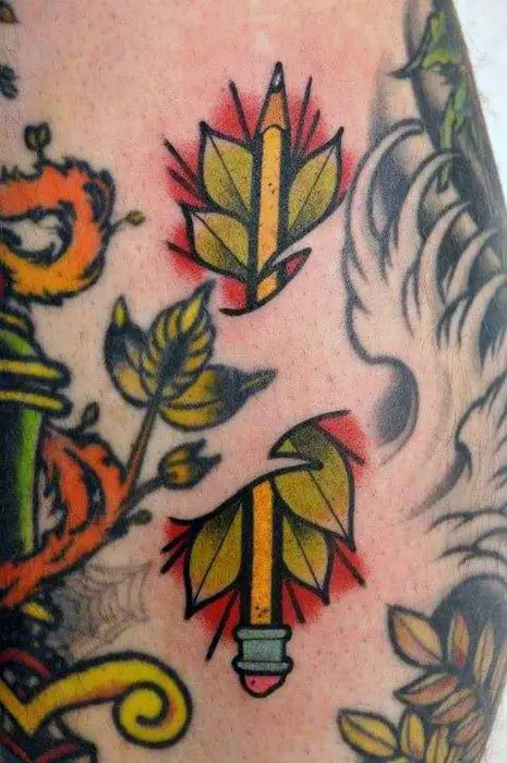 pencil-with-leaves-male-filler-tattoo-design-ideas
