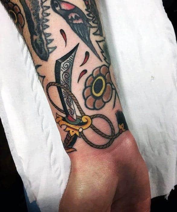 wrist-sword-filler-tattoos-men