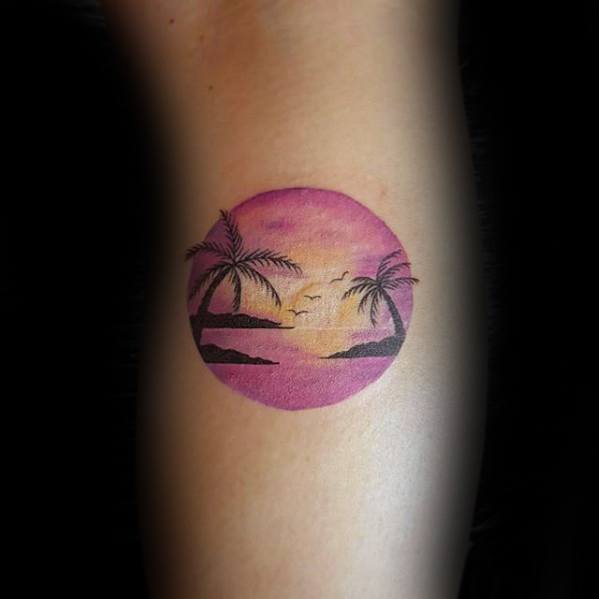 side-of-leg-mens-sunset-beach-tropical-circle-small-tattoo