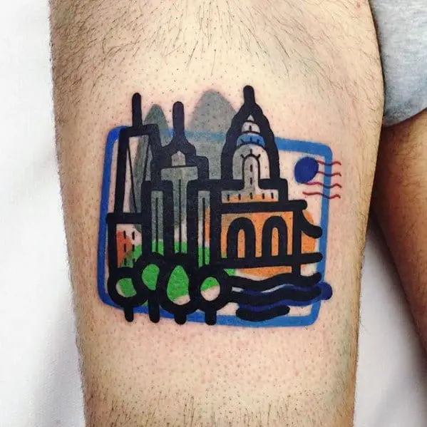 mens-postage-stamp-city-skyline-small-colorful-thigh-tattoo