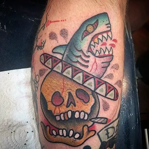 shark-sombrero-with-skull-guys-small-colorful-leg-tattoos