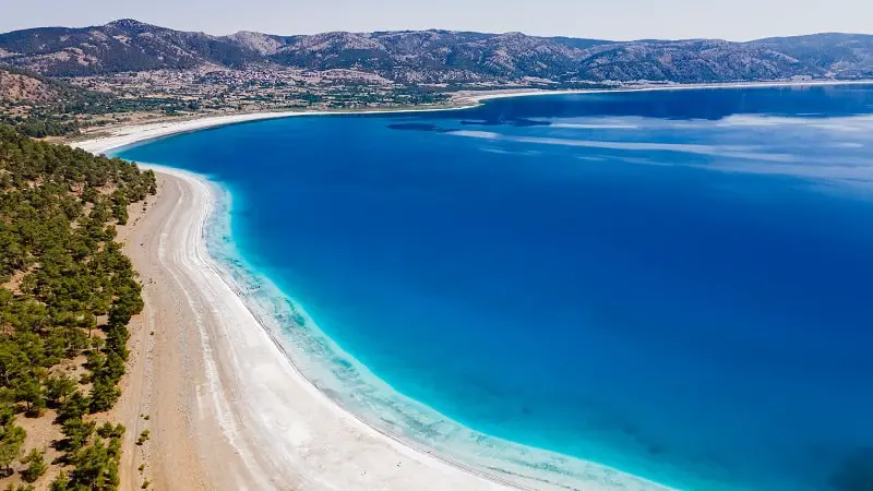 Lake Salda in Burdur, Turkey. High angle view of dried-up crater lake with water rich in magnesium. Turkey Maldives.