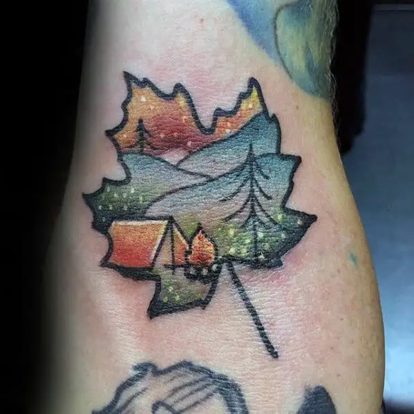 leaf-with-camping-scene-guys-small-nature-tattoo-on-arms