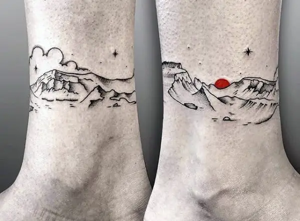 lower-leg-band-guys-mountain-nature-small-tattoo-designs