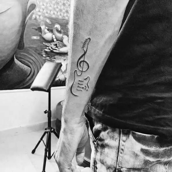 simple-music-guitar-guys-outer-forearm-note-tattoo