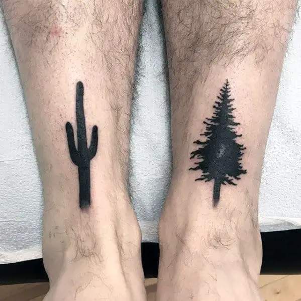 cactus-with-pine-tree-mens-solid-black-ink-leg-tattoos