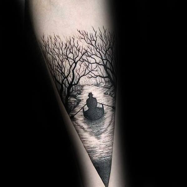 man-in-boat-on-river-with-trees-mens-small-forearm-tattoo