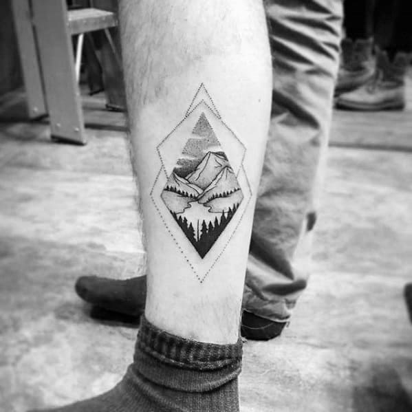 mountain-landscape-with-trees-mens-small-geometric-leg-tattoo