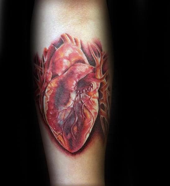 amazing-mesn-red-realistic-heart-inner-forearm-tattoo