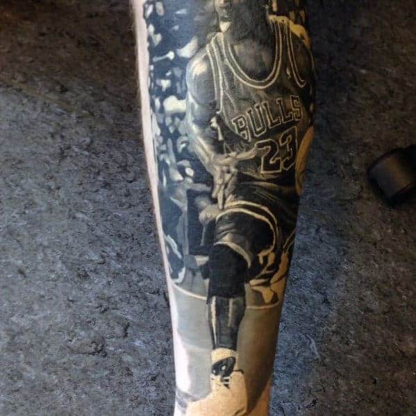 black-and-grey-realistic-mens-forearm-jordan-tattoo